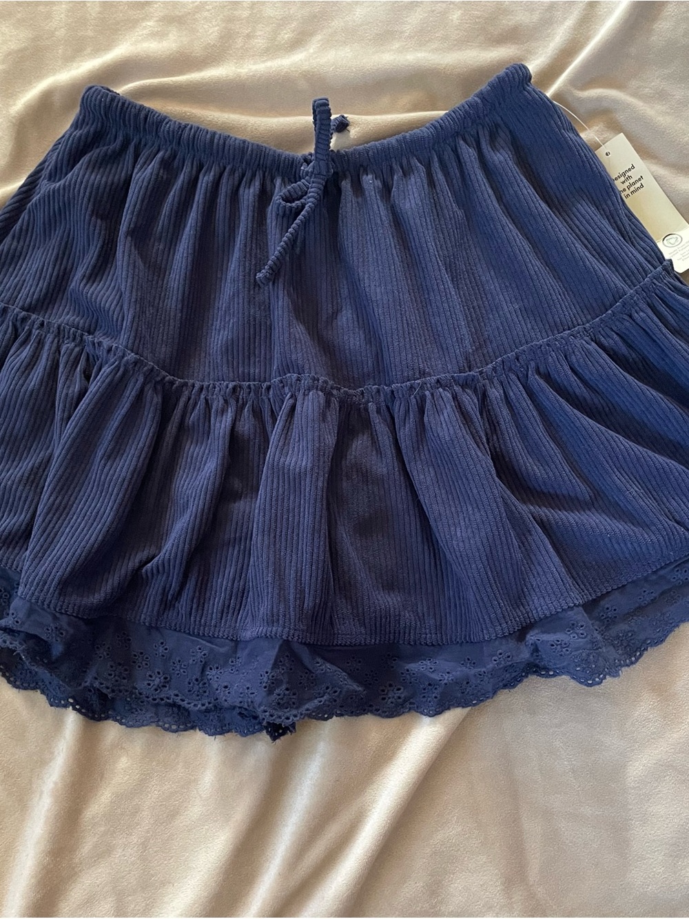No Boundaries Navy Tiered Mini Skirt with Eyelet Hem
